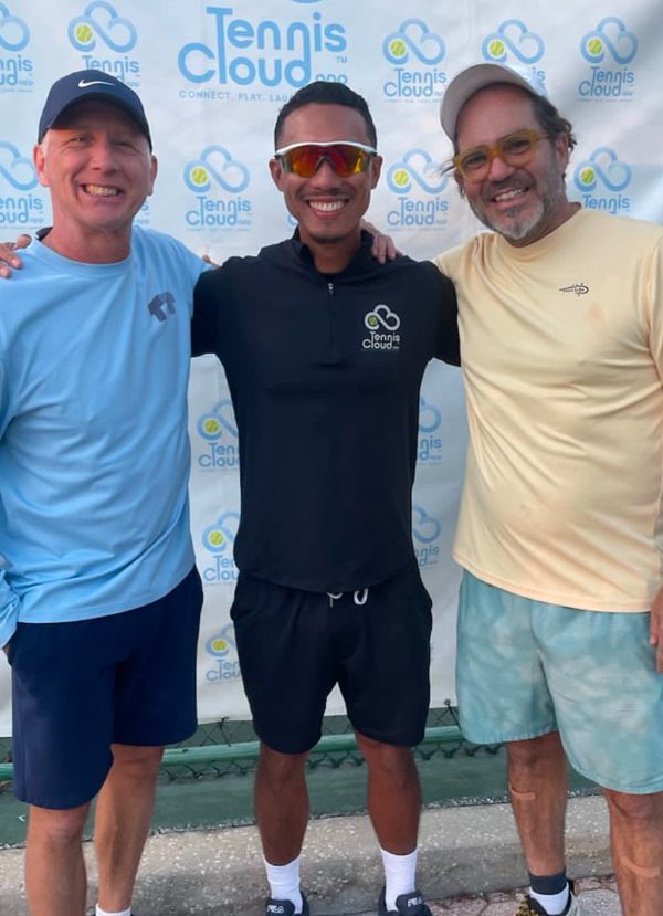 Coach Liam with two players at a Tennis Cloud event